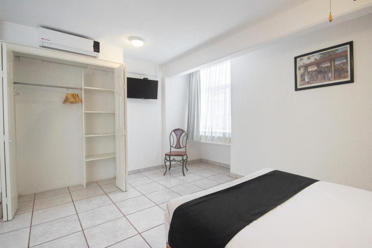 Capital O Hotel Suites Andrade Leon Exterior photo