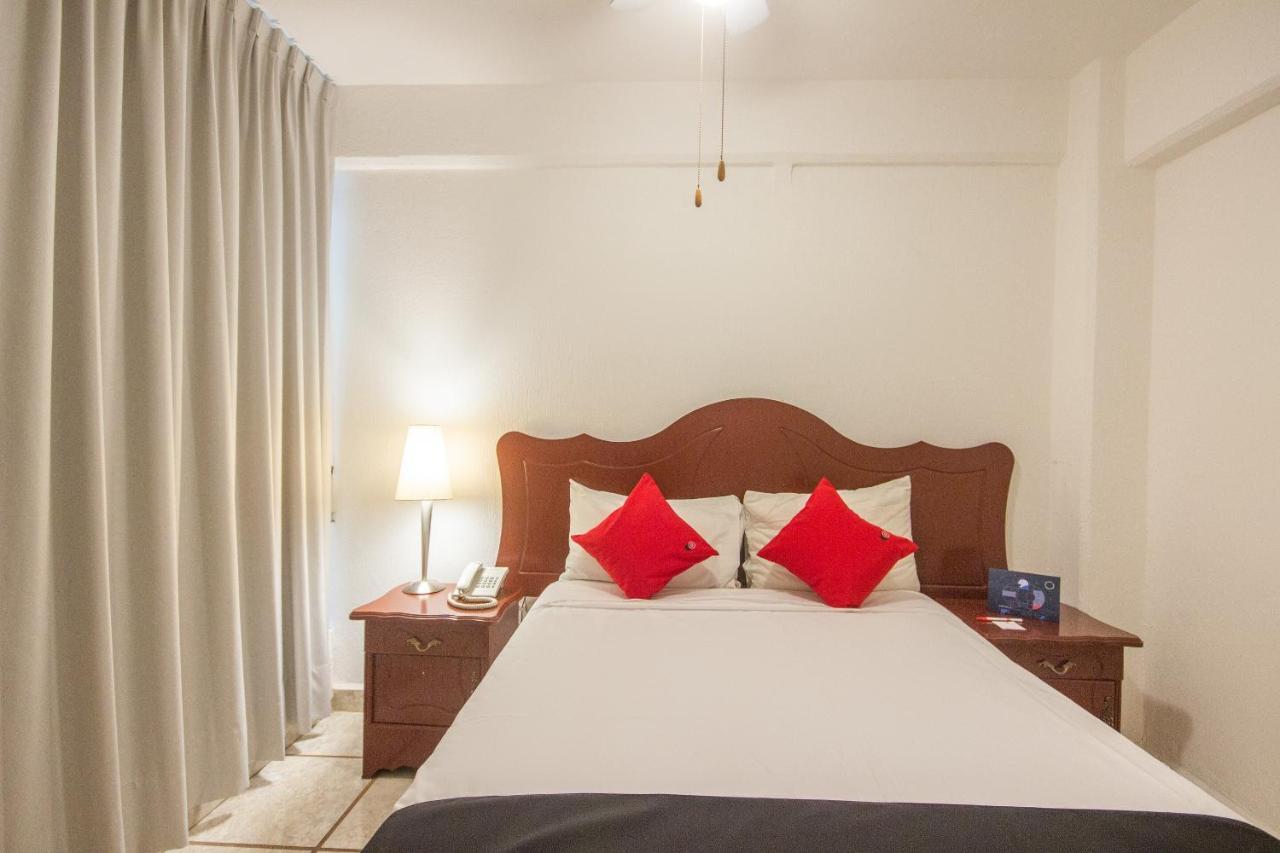 Capital O Hotel Suites Andrade Leon Exterior photo