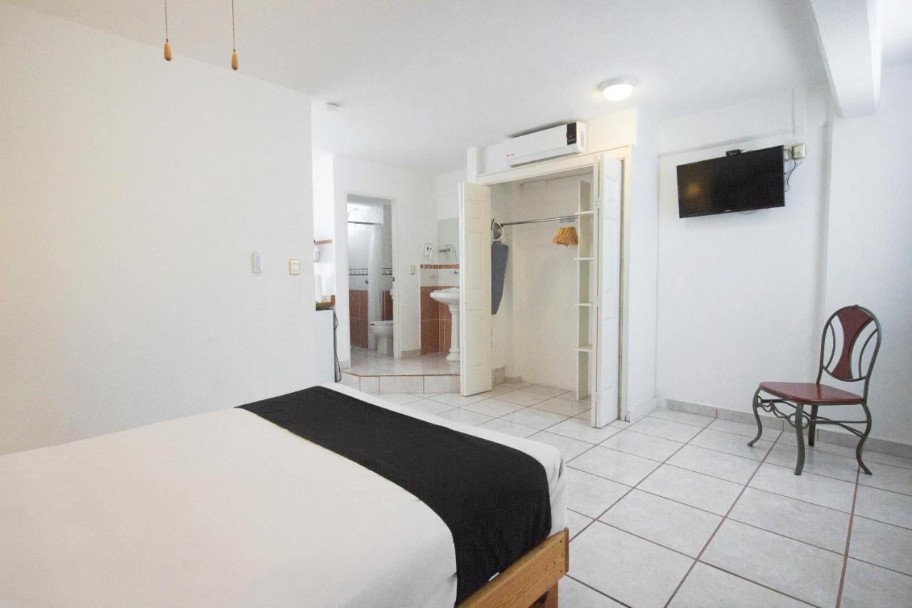 Capital O Hotel Suites Andrade Leon Exterior photo