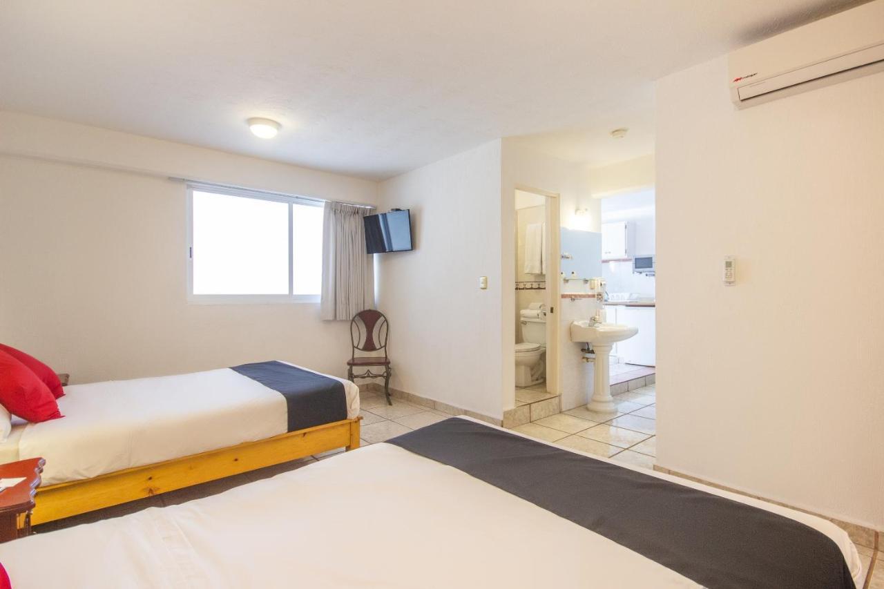 Capital O Hotel Suites Andrade Leon Exterior photo