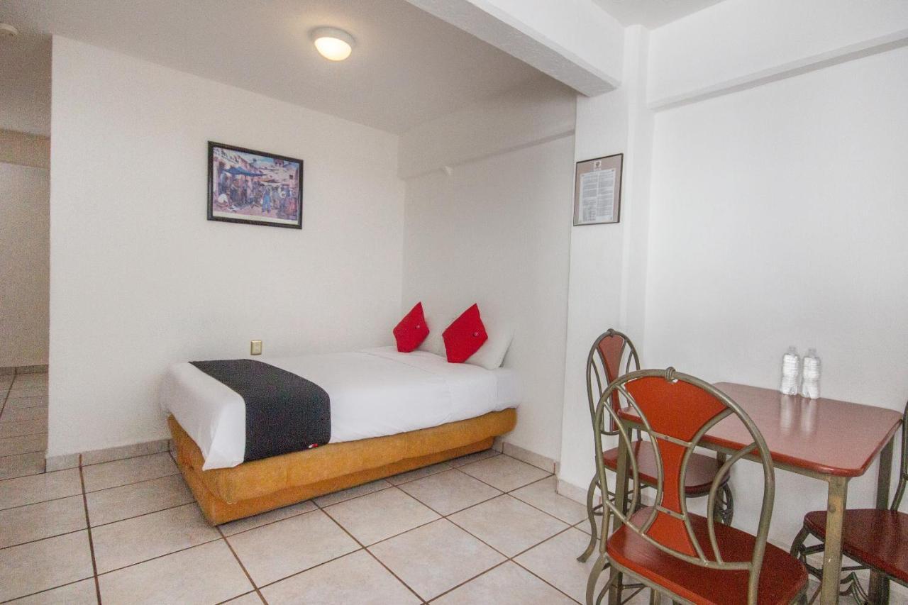 Capital O Hotel Suites Andrade Leon Exterior photo