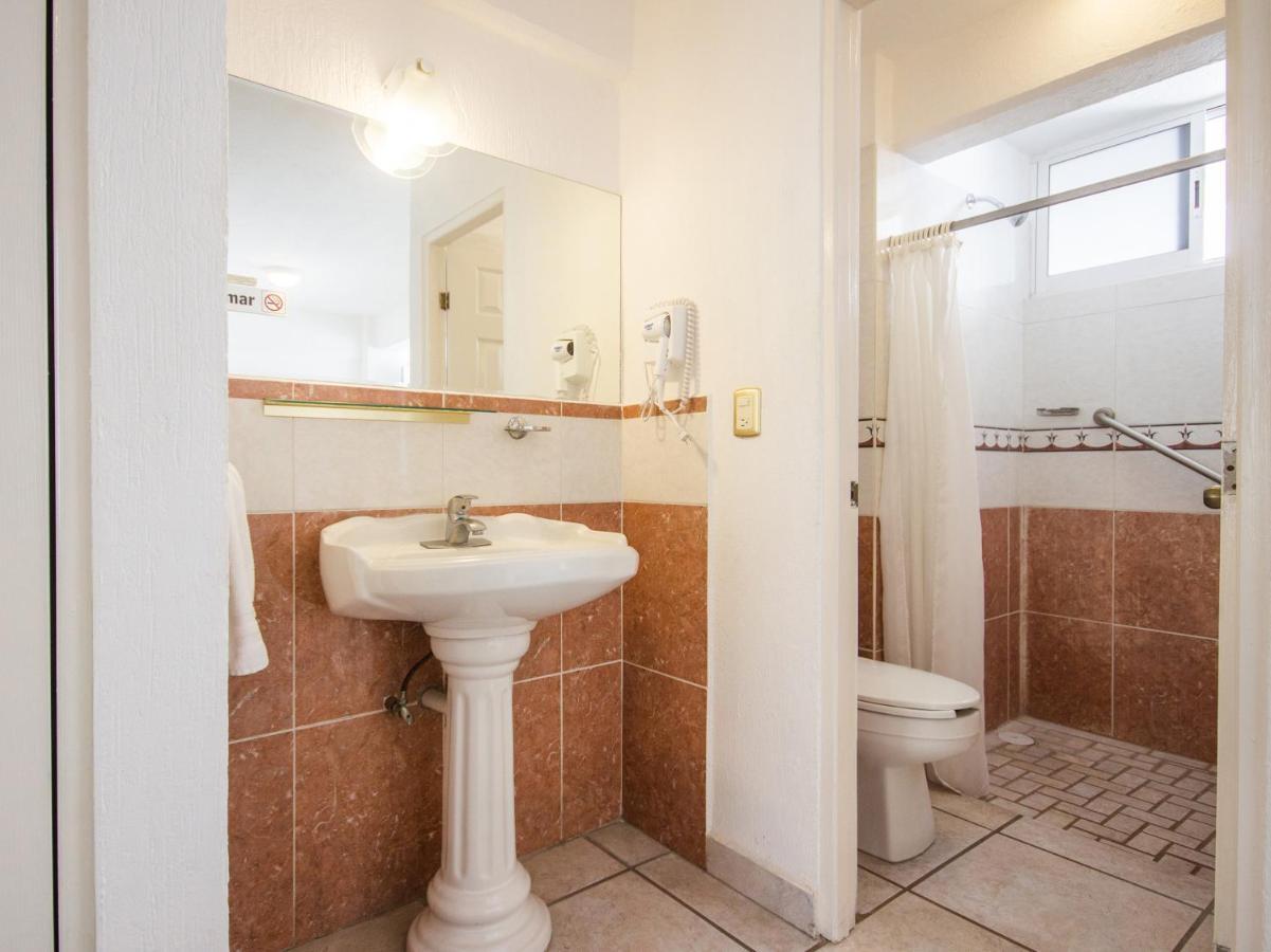Capital O Hotel Suites Andrade Leon Exterior photo