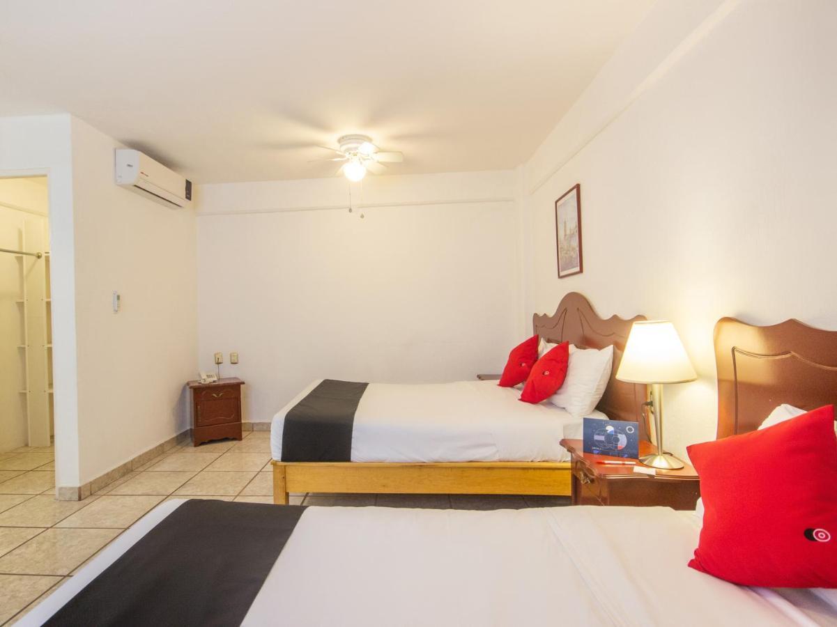 Capital O Hotel Suites Andrade Leon Exterior photo