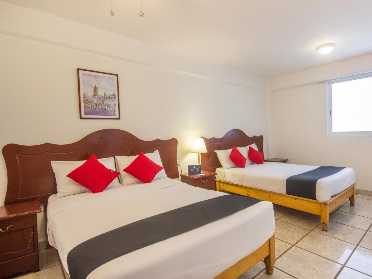 Capital O Hotel Suites Andrade Leon Exterior photo