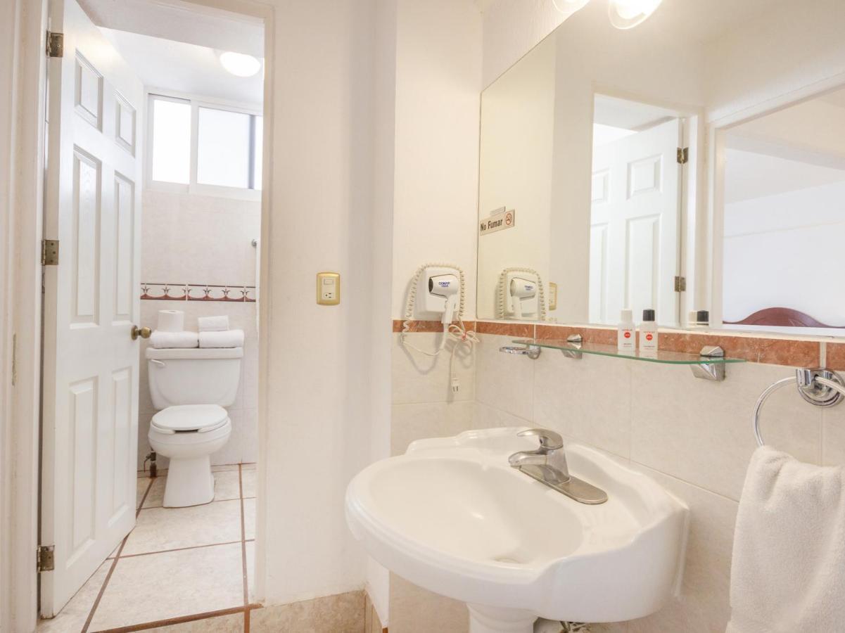Capital O Hotel Suites Andrade Leon Exterior photo