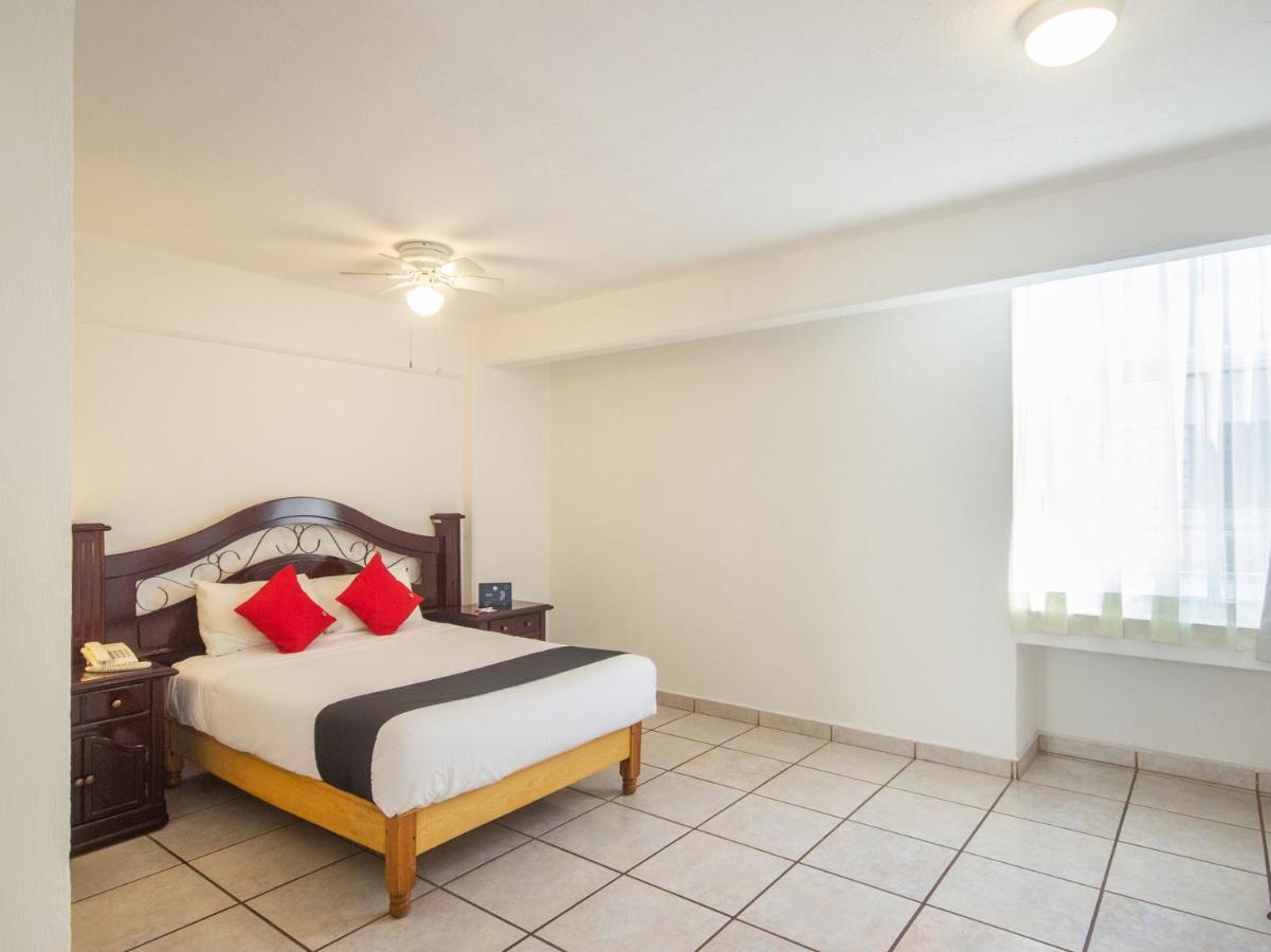 Capital O Hotel Suites Andrade Leon Exterior photo